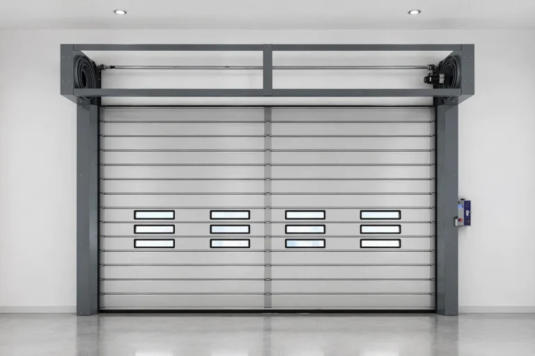 Interior view of an ABX automatic electric roll-up garage door featuring modular panels, vision windows, and a wall-mounted smart control box for seamless industrial maintenance.